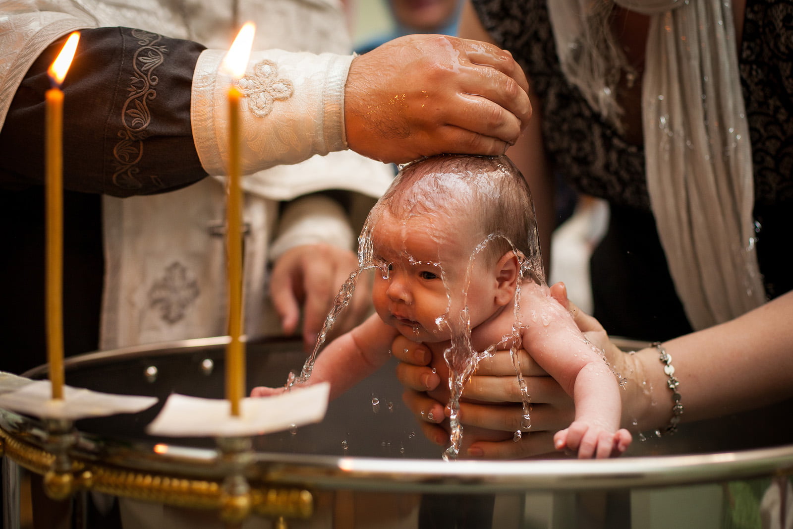 Concret, diferenta dintre botezul catolic si cel ortodox